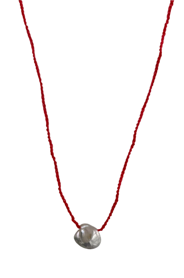 Collana rossa con pendente perla